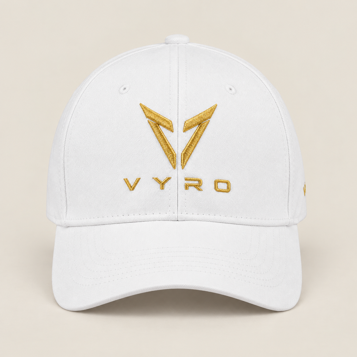 White VYRO cap with gold emblem, front view